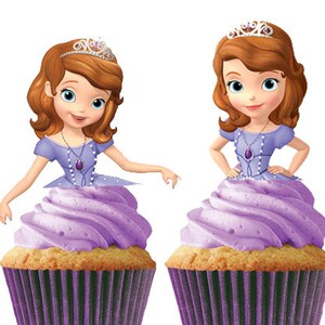 May include: Two cupcakes featuring a cartoon princess design. The princess has auburn hair, a tiara, and a purple dress. The cupcakes have purple frosting and are in purple paper liners. The cupcakes are a fun and festive treat.