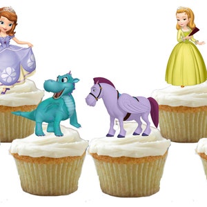 May include: Set of six cupcake toppers featuring characters from the animated series Sofia the First. The toppers include Sofia, a dragon, a horse, a rabbit, a princess, and a prince. The toppers are printed on edible paper and are perfect for decorating cupcakes for a Sofia the First themed party.