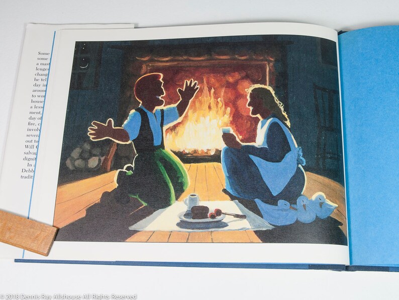 May include: Illustration from a children's book depicting a cozy scene. A man and woman are seated near a fireplace, with a table set with food. Three ducklings are in the foreground. The artwork is in warm tones.