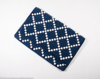 Beaded clutch bag in blue and white, made in Hong Kong, designed by Mr. Jonas