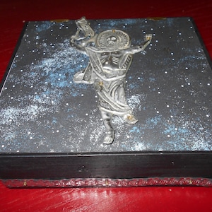 Wooden box with metal icon Christ
