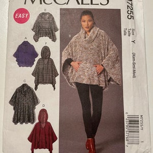 May include: A sewing pattern for a hooded poncho with six different variations. The pattern is for sizes X-Small, Small, and Medium. The pattern is labeled "Easy" and is from McCall's.