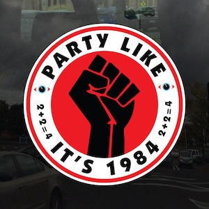 May include: A red and white circle sticker with the text "Party Like It's 1984" and a black fist in the center. The sticker also has two eyes with the text "2+2=4" on either side of the fist.