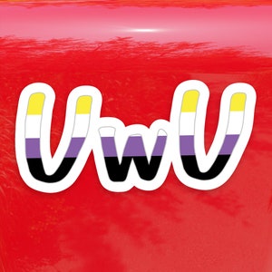 May include: A sticker with the letters "UwU" in a white outline. The letters are filled with the colors of the non-binary pride flag: yellow, white, purple, and black.