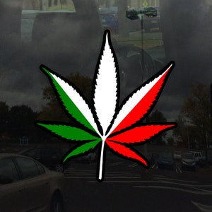 May include: A green, white, and red marijuana leaf sticker. The leaf is stylized to look like the Italian flag.