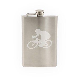 May include: A silver stainless steel flask with a cyclist silhouette etched on the front.