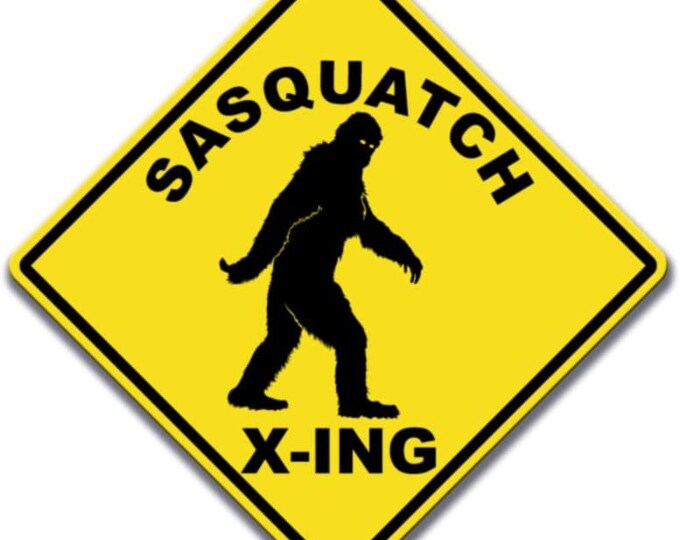 Applicable Pun - Sasquatch Crossing Walking - Yellow Diamond Sign 15 Inches Tall by 15 Inches Wide Aluminum Sign