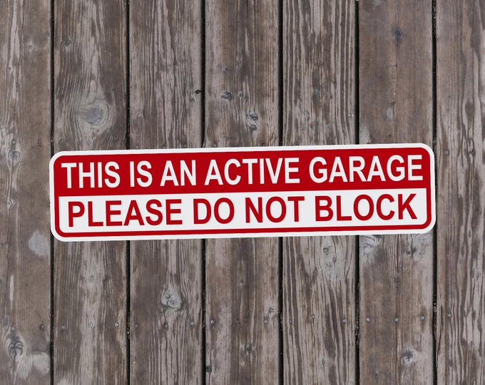 This is an Active Garage Please Do Not Block Sign – 17 x 4 Inch Aluminum Metal Sign for Driveways, Parking Lots, and Private Property