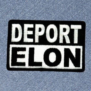 May include: Black and white embroidered patch with the text "DEPORT ELON" in white letters on a black background.