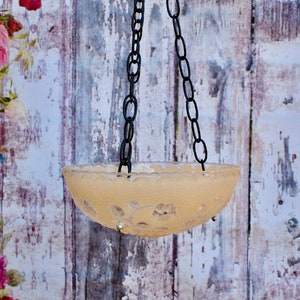 Hanging bird feeder in beige