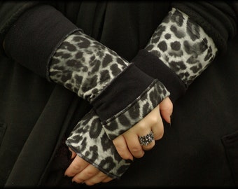 Cuffs Arm warmers Hand warmers Reversible cuffs on both sides black Leopard pattern Fleece Patchwork Hand warmer soft warm cuddly