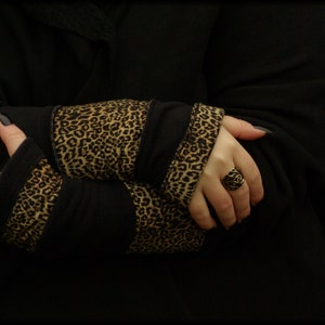 Cuffs Arm warmers Hand warmers Reversible cuffs on both sides black Leopard pattern Fleece Patchwork Hand warmer soft warm cuddly