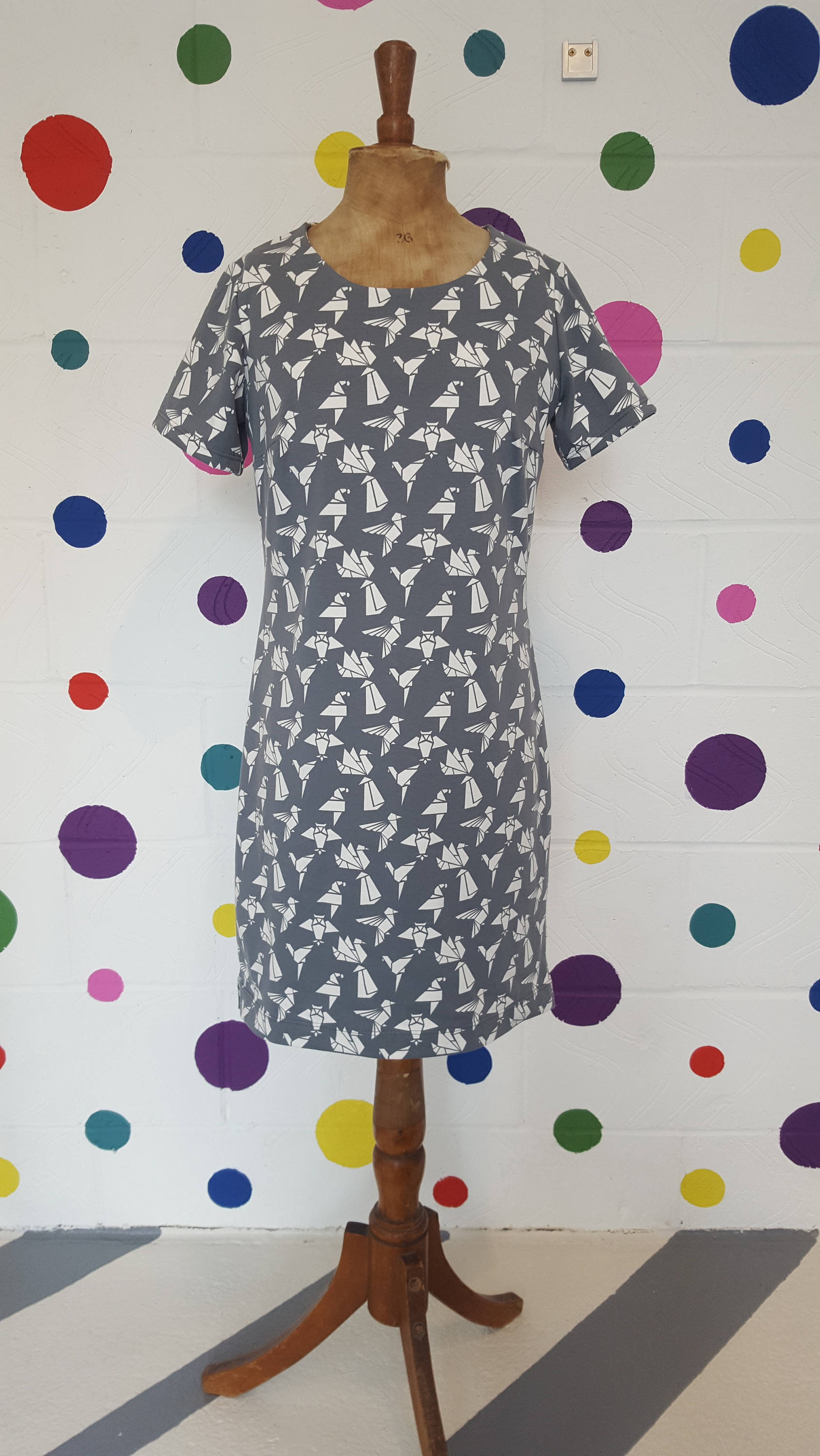bird and grey dresses