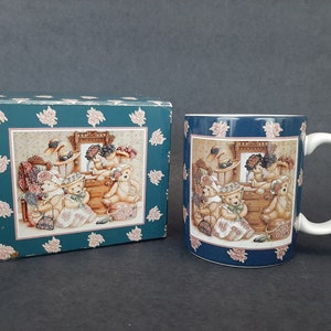 Lang And Wise Collector Mugs by Susan Winget “Hats for Teddy”,