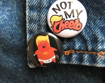 Not My Cheeto button or Mini Baby Trump Blimp