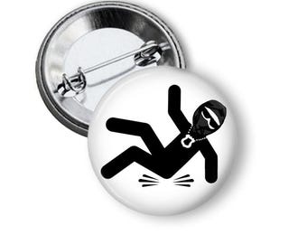 Ice Agent Falling on Ice Button, Activism Pin