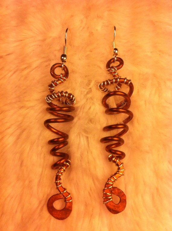 Items similar to Spiral dangle hammered rod mixed metal earrings ...
