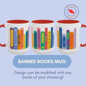 May include: A white ceramic mug with a red interior and handle, featuring a colorful graphic of book spines with titles like 1984, The Handmaid's Tale, and The Bluest Eye. The text BANNED BOOKS MUG appears below, along with The Lucky Guppy Co. logo.