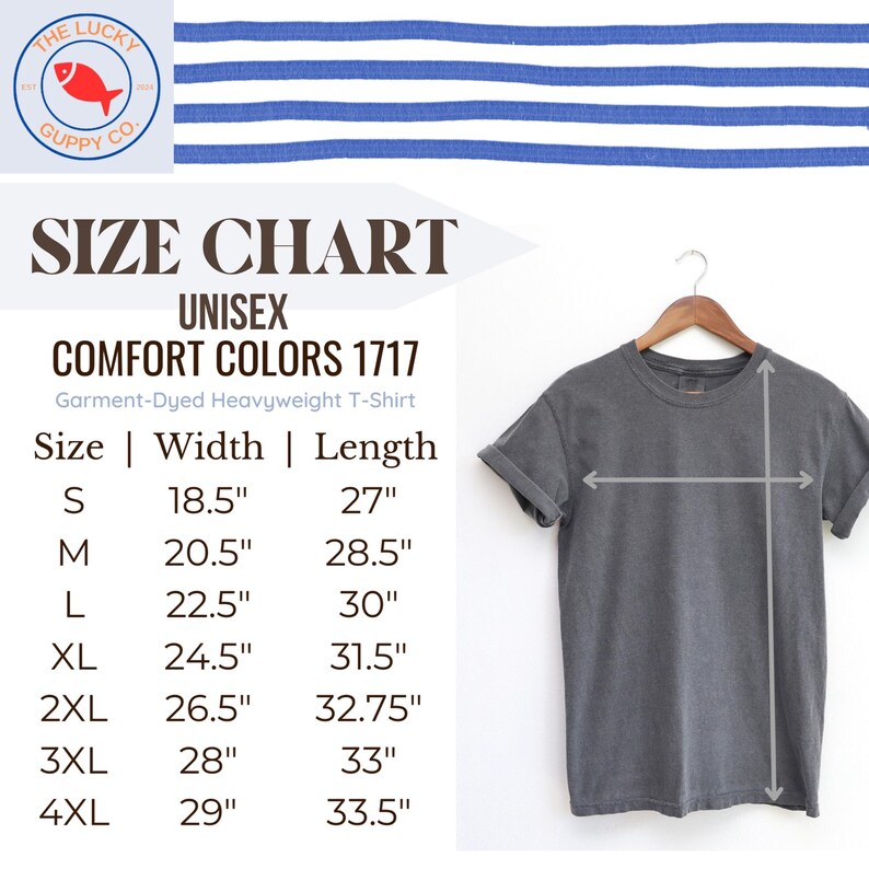 May include: A gray Comfort Colors 1717 unisex t-shirt hanging on a wooden hanger. The size chart shows measurements in inches: S (18.5" width, 27" length), M (20.5" width, 28.5" length), L (22.5" width, 30" length), XL (24.5" width, 31.5" length), 2XL (26.5" width, 32.75" length), 3XL (28" width, 33" length), and 4XL (29" width, 33.5" length).