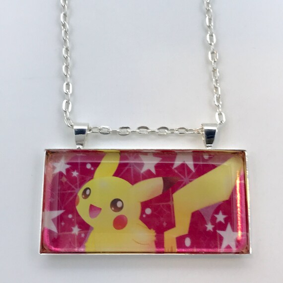 Charizard first edition necklace, what you think? : r/PokemonTCG