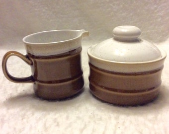 Imperial Stoneware Japan sugar bowl and creamer set.