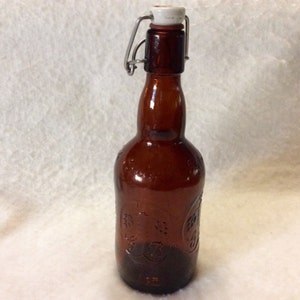 Grolsch beer amber glass bottle with ceramic snap top  1950s