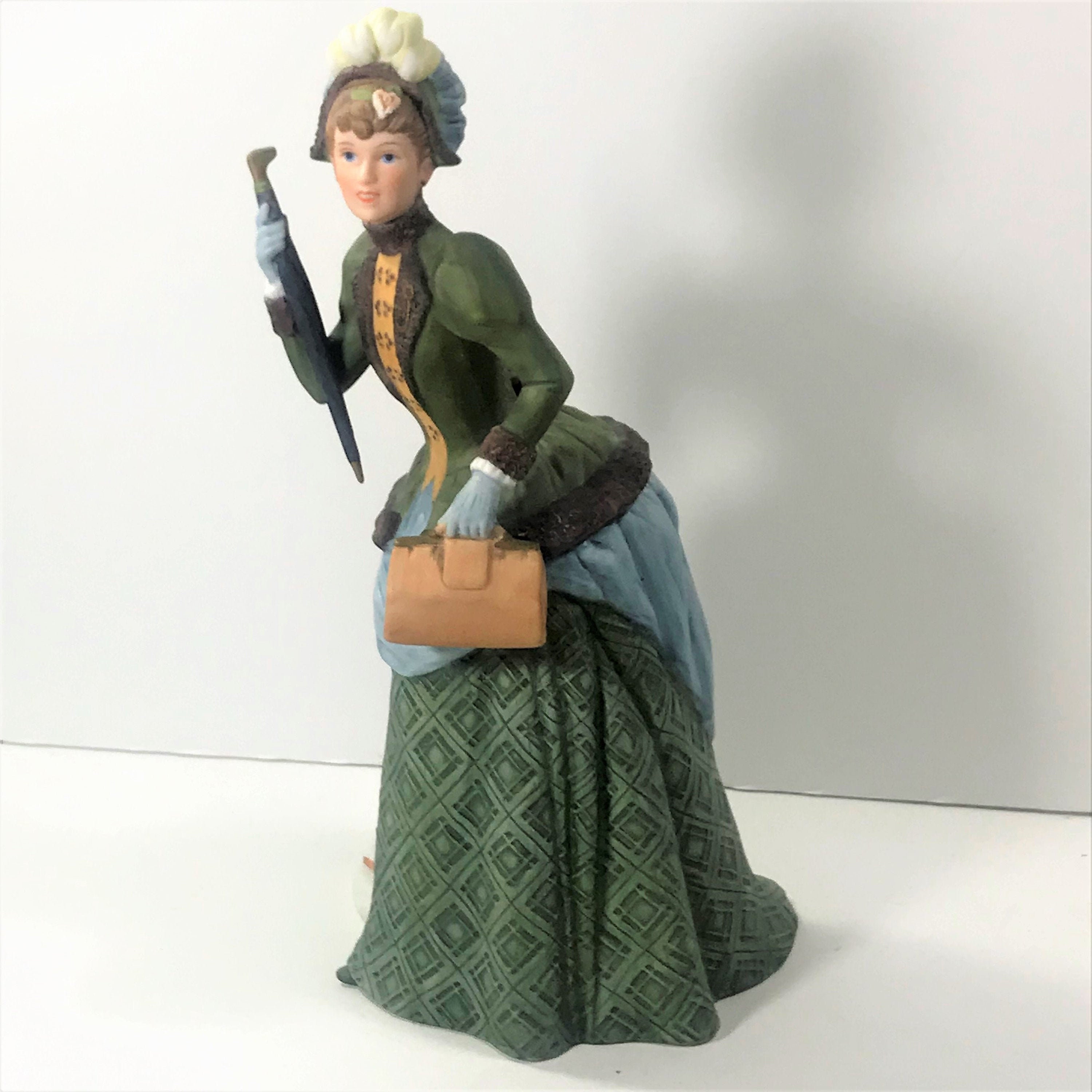 Avon ceramic sales dolls