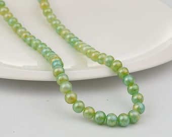 Light Green and gold 8mm glass beads