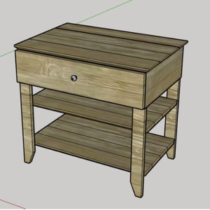 May include: A wooden end table with a drawer and two shelves. The table is light brown and has a simple design.