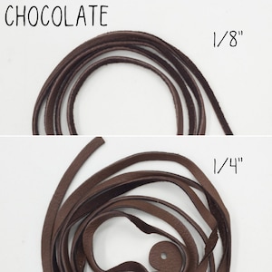 May include: Two pieces of brown leather cord, one 1/8 inch thick and the other 1/4 inch thick.