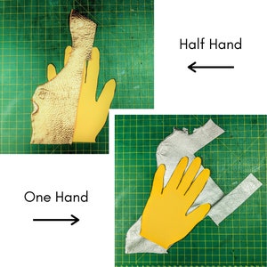 May include: Two pieces of leather cut out in the shape of a hand. One piece is a full hand, the other is half a hand. The leather is a light brown color and has a textured surface. The text "One Hand" and "Half Hand" is written on the image.