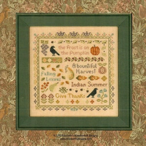 May include: A cross-stitch sampler with a fall theme. It features a variety of autumnal imagery, including pumpkins, leaves, birds, and the text "The Frost is on the Pumpkin, A Bountiful Harvest, Indian Summer, Give Thanks".