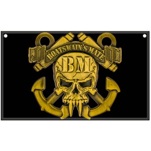 May include: A black and gold flag with a skull and crossbones design. The skull has a gold crown and the text "BOATSWAIN'S MATE" is written above the skull. The letters "BM" are written on the skull's forehead.