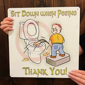 Bathroom &quot;Sit Down&quot; Kid Metal Sign