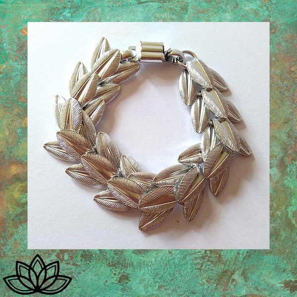 Vintage leaf design bracelet, light weight, silver tone, 8 inches long