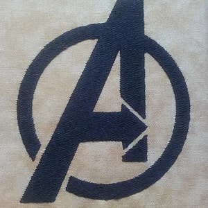 May include: A black embroidered patch with the Avengers logo, featuring a stylized "A" inside a circle.