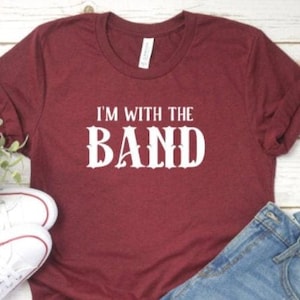 With the band shirt, music shirt, rock and roll shirt, concert shirt, band