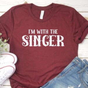 With the singer shirt, music shirt, rock and roll shirt, concert shirt, band shirt