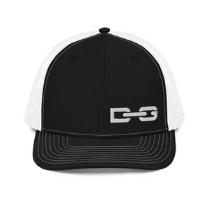 May include: Black and white trucker hat with a white chain link logo that says "DG" on the front.