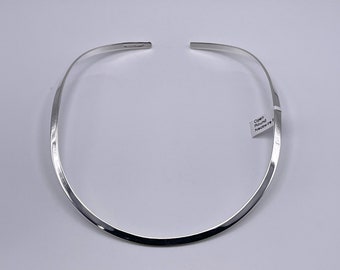 Charles Albert 4 mm Flat Round Smooth Neck Wire Open to the Back and created in Plated Sterling Silver