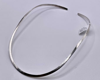 Charles Albert Oval Flat Neck Wire Open to the Back and created in 4 mm Smooth Flat Fine Sterling Silver