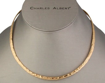 Charles Albert 4 mm Flat Round Hammered Neck Wire Open to the Back and created in their Signature Alchemia Gold