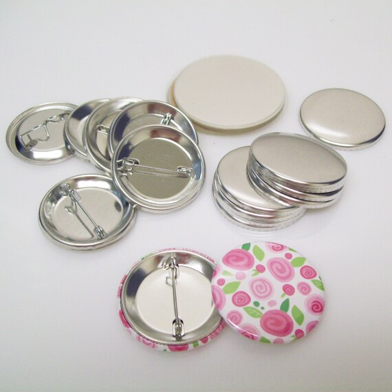 2-1/4 button making supplies include shells, mylar and pinned backs.