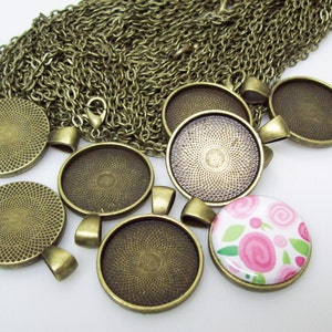 100 Antique Bronze Pendant Trays 23mm and 24&quot; Rolo Chains for use with 1&quot; Buttons.