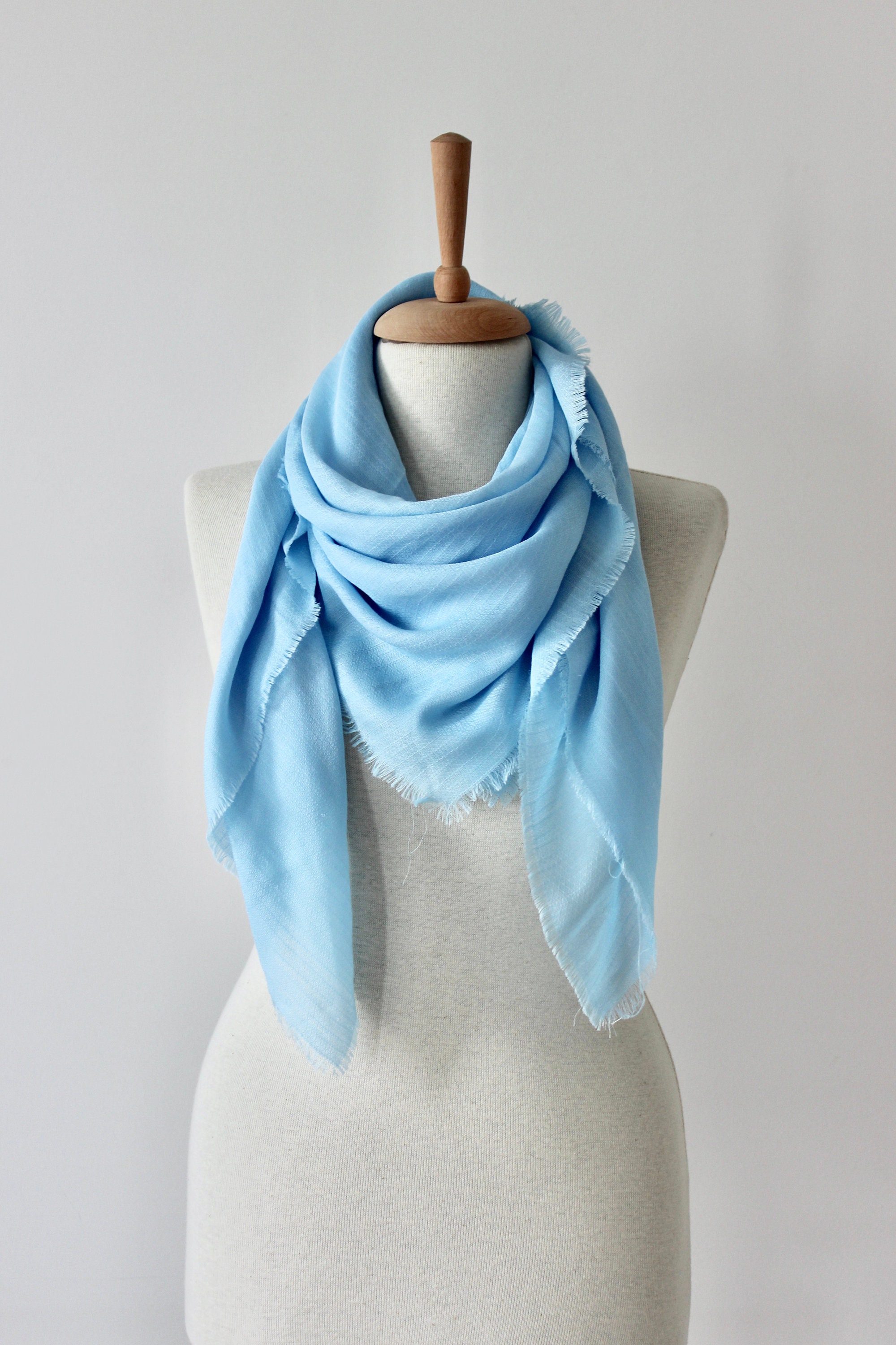 light blue scarf