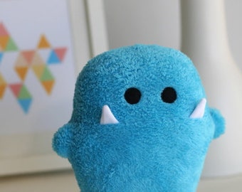 SiGGi cuddly monster in turquoise