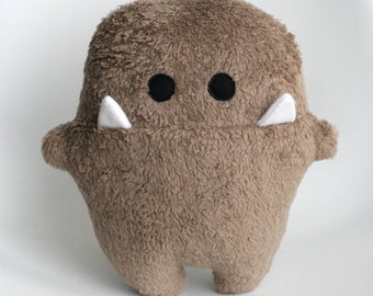 SiGGi cuddly monster in brown