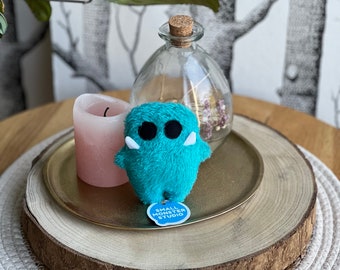 SiGGi Lucky Monster in turquoise green, a perfect companion when travelling, an encourager and comforter