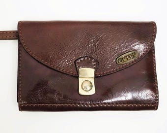 Bolso de mano vintage de los años 70 de la marca Gulp!, con cremallera, de piel marrón caoba.