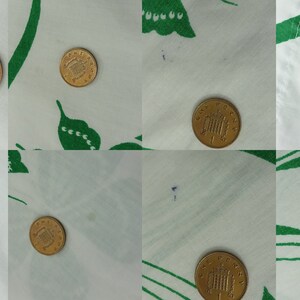 May include: Eight gold-colored coins with the inscription "ONE PENNY" on a white background with green floral patterns.